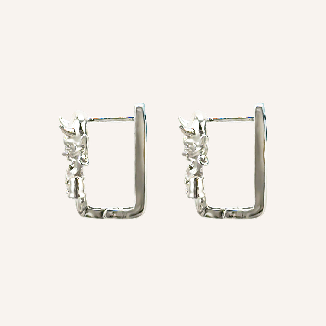 Ignatius Oni Mask and Bow Hoop Earring